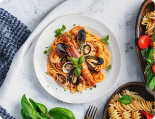 Spaghetti on a white tablecloth