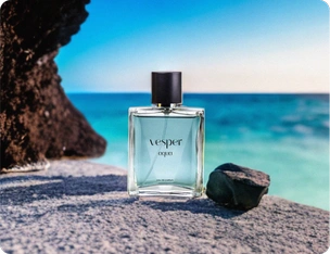 Perfume on a beach background